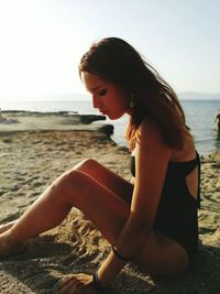 Woman relaxing on beach