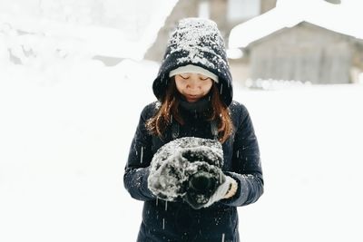 Portrait of young woman in winter