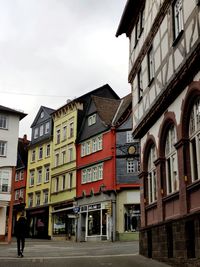 Buildings in city against sky