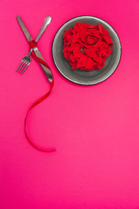 High angle view of red chili peppers on table