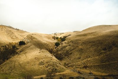 Scenic view of desert against sky