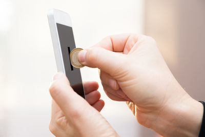 Close-up of woman using mobile phone