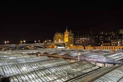 Illuminated cityscape at night