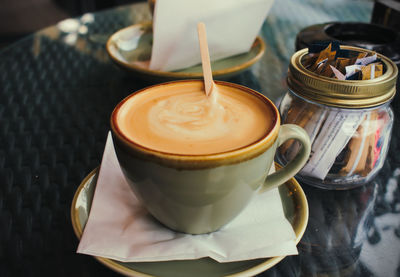 Close-up of coffee cup on table