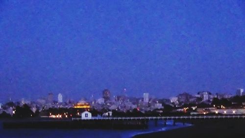 Illuminated cityscape at night