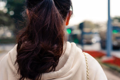 Rear view portrait of woman
