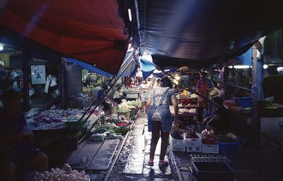 People at market stall