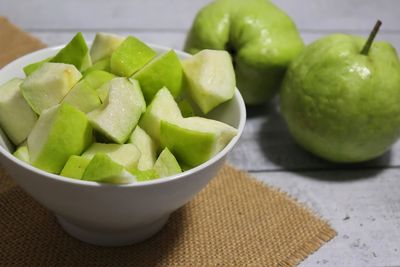 Close-up of fruits in bowl on table