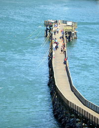 High angle view of people on boat in sea