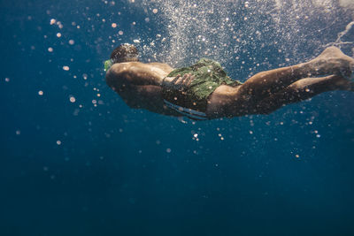 Man swimming underwater