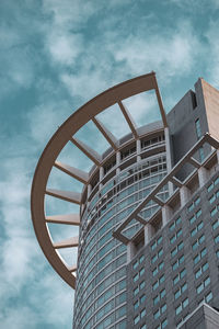 Low angle view of modern building against sky