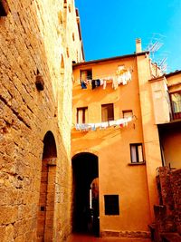 Low angle view of buildings against sky