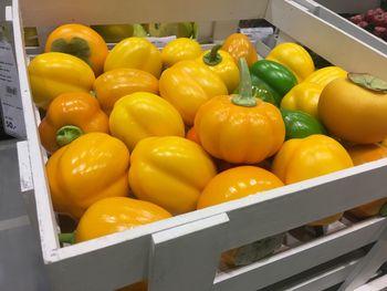 Close-up of yellow bell peppers for sale in market