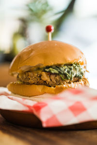 Close-up of burger in plate on table