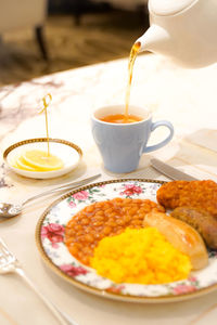 Close-up of breakfast served on table