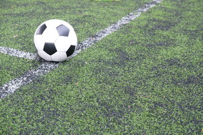 High angle view of soccer ball on field