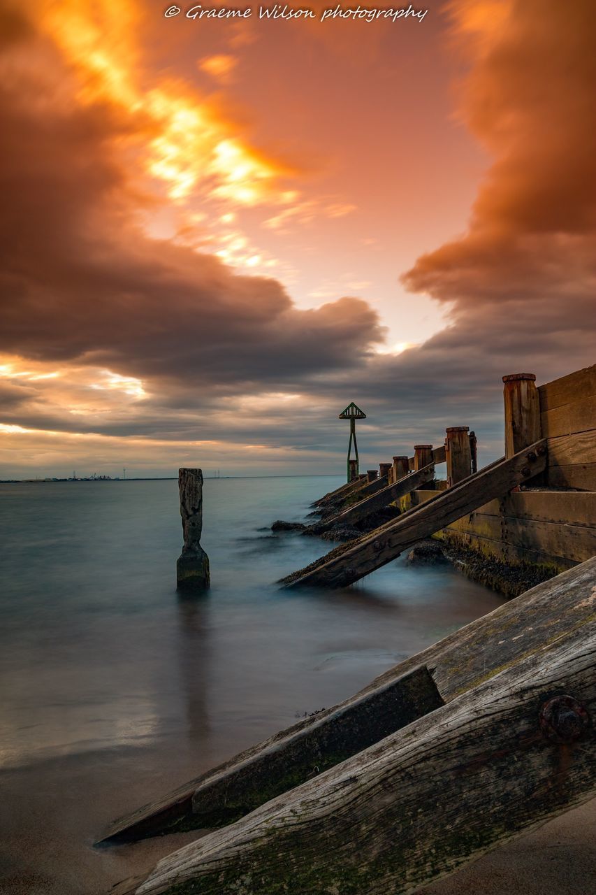 VIEW OF SEA AGAINST CLOUDY SKY