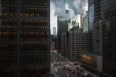 Aerial view of illuminated buildings in city