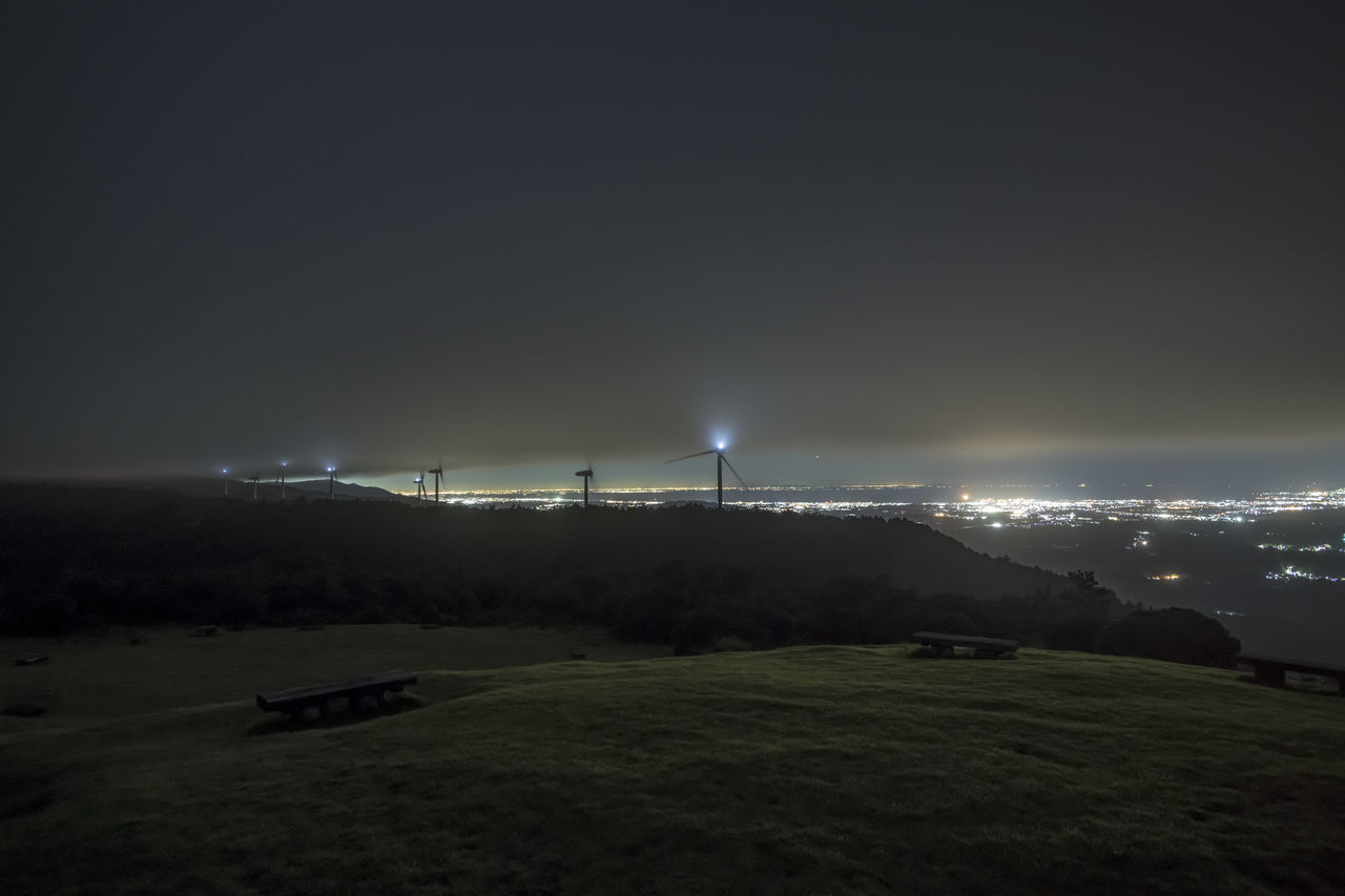 SCENIC VIEW OF LANDSCAPE AGAINST SKY AT NIGHT