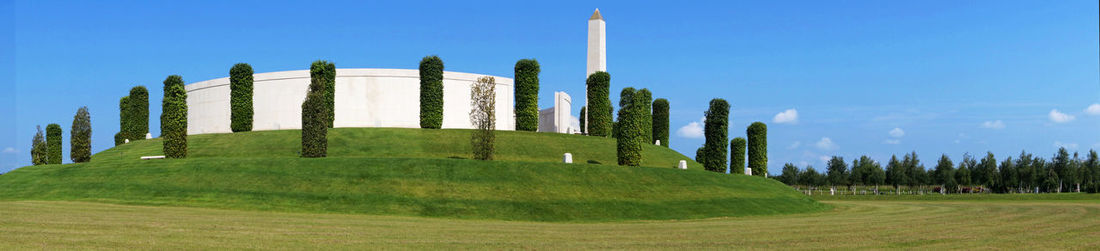 Low angle view of built structure against blue sky