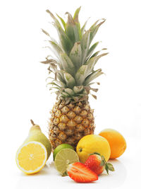 Close-up of fruit on white background