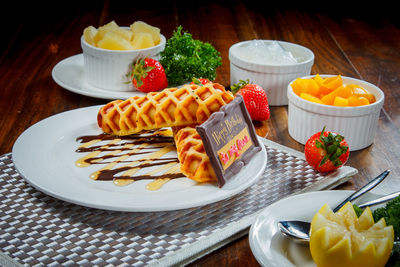 Close-up of food served on table