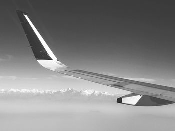 Low angle view of airplane flying in sky