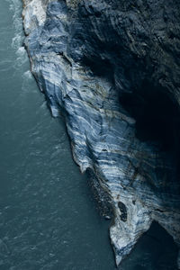 Close-up of rock formation in sea