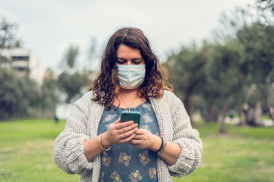 Young woman using mobile phone