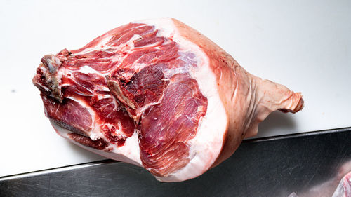 Close-up of meat on cutting board