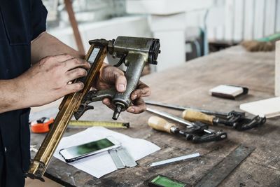 Man working on wood