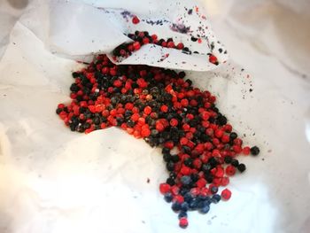 Close-up of frozen berries on white fabric