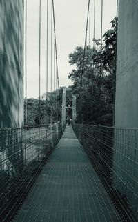 Bridge against sky in city