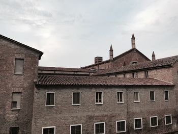 Low angle view of old building against sky