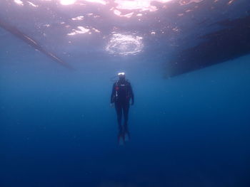 Man scuba diving in sea