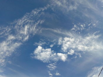 Low angle view of clouds in blue sky