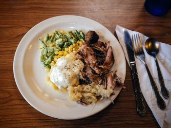 High angle view of fresh meal served on table