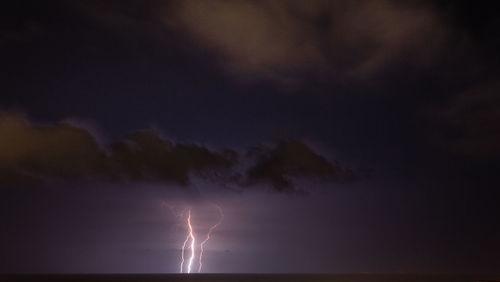 Lightning in sky at night