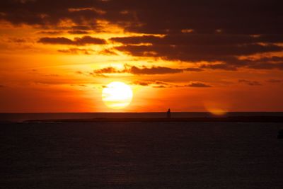 Scenic view of sea at sunset