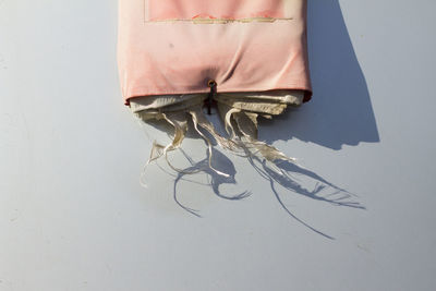 Folded fabric on table in sunny day