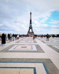 Group of people in front of tower