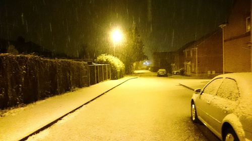 Illuminated street lights at night