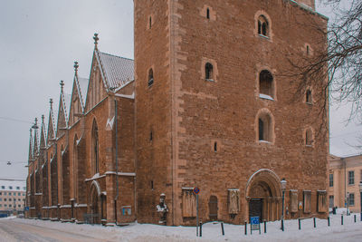 View of buildings in city during winter