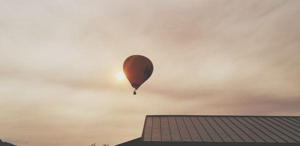 Low angle view of hot air balloon flying in sky