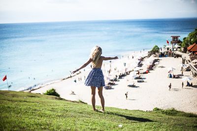 Woman standing on beach