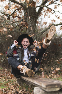 Portrait of smiling young woman outdoors