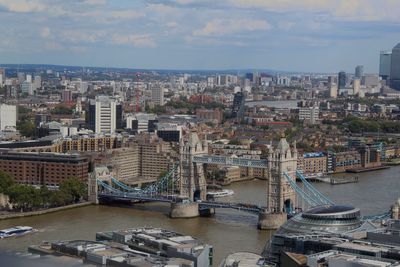 High angle view of river amidst buildings in city