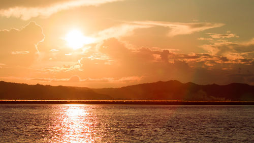 Scenic view of mountains against sky during sunset