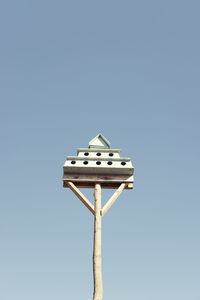 Low angle view of floodlight against clear sky
