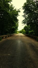 Road passing through trees